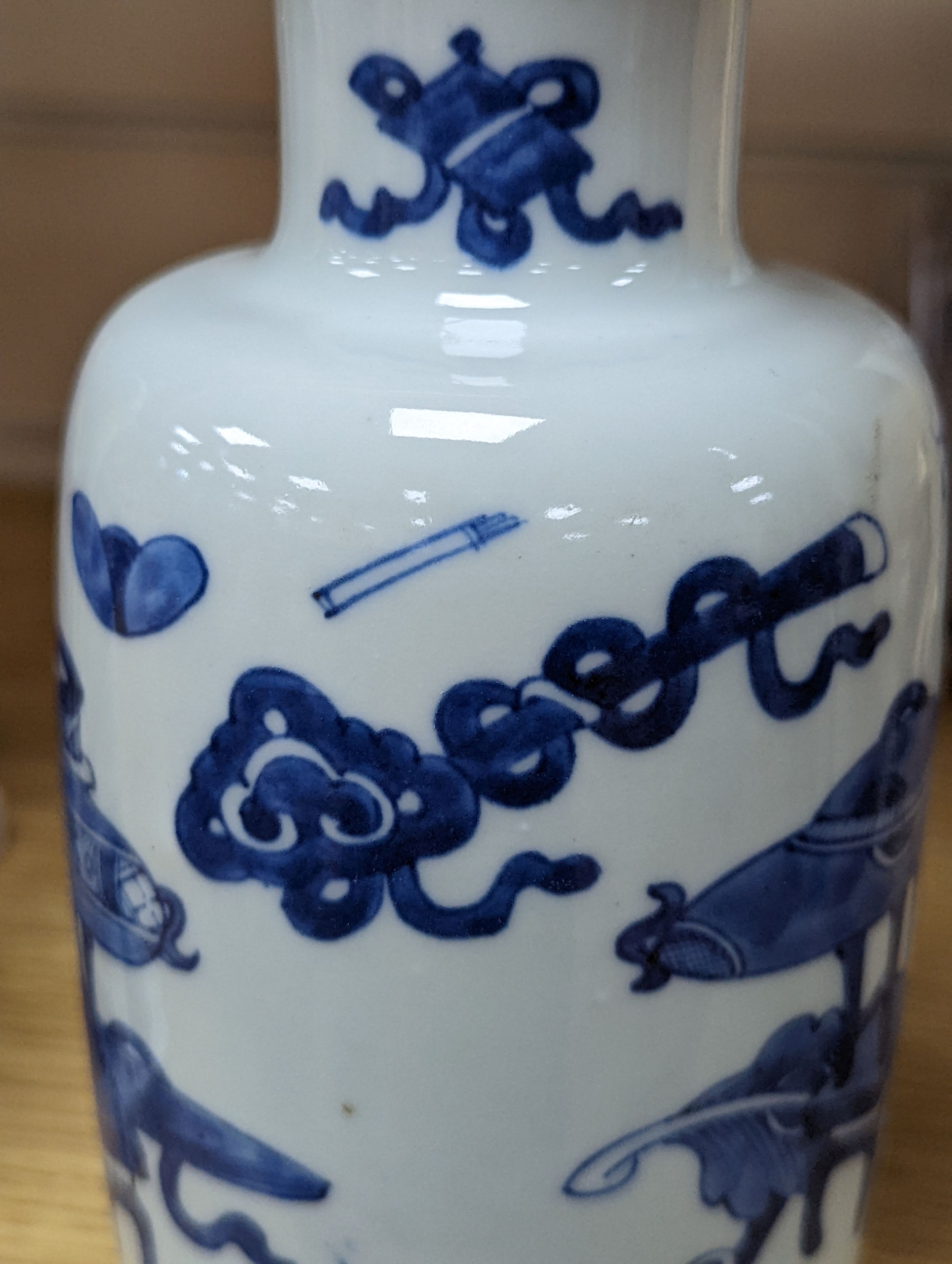 A Chinese blue and white ‘Antiques’ vase, 19.5 cms high.